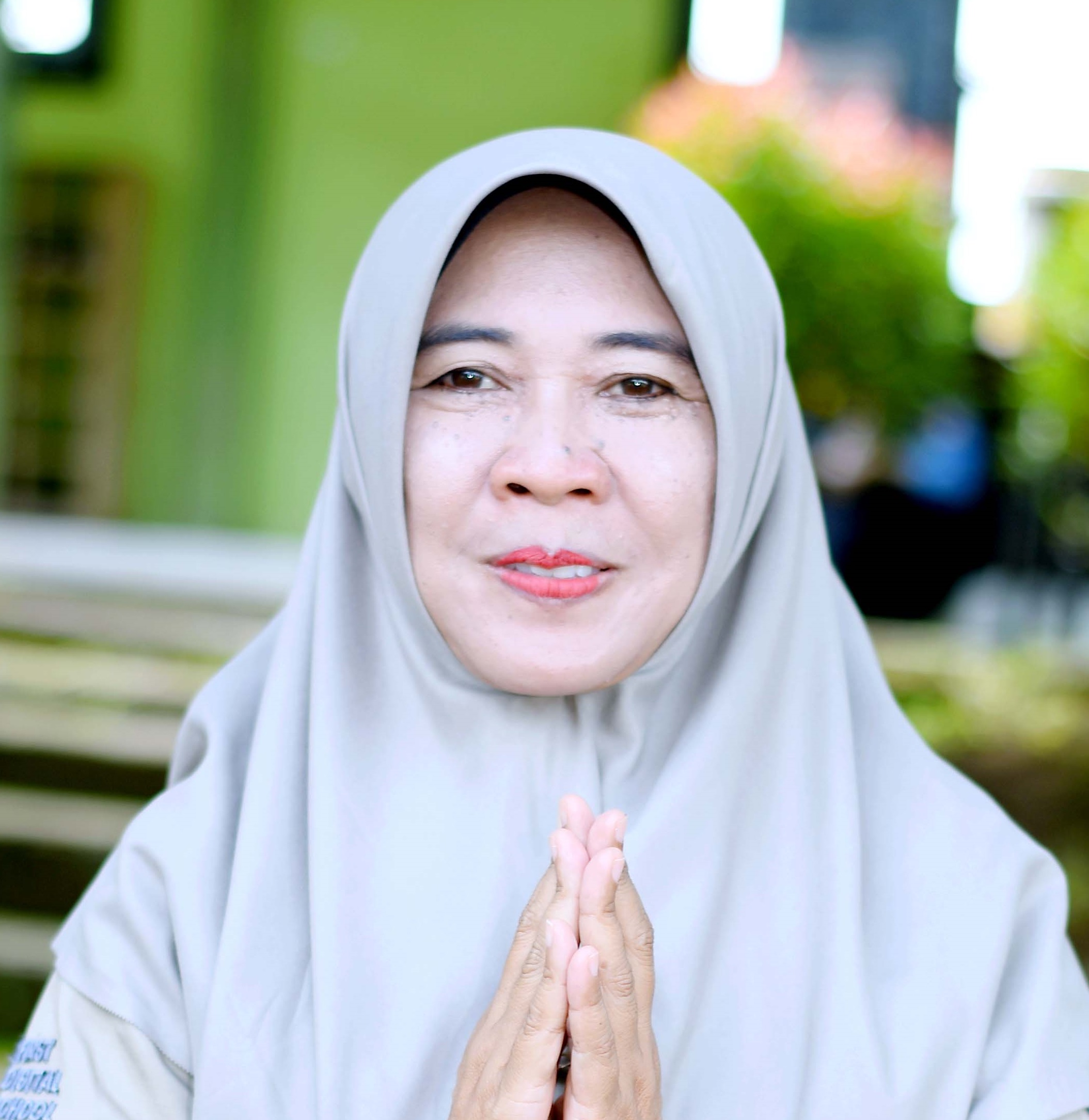 Hj. HORIDATUL BAHIYAH, S.PdI.