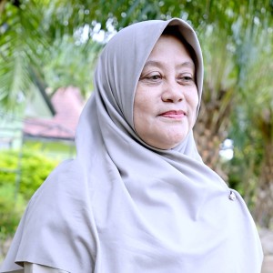 Dra. RIFQIYATI
